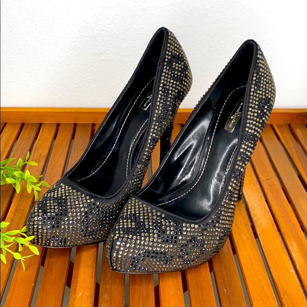 Report Signature Blk Studded Cheetah Pumps Size 8